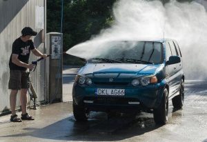 washing vehicles with pressurized water